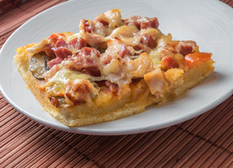 piece of pizza in a plate