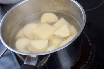Potatoes boiling in a pot