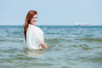 Girl relaxing in sea water