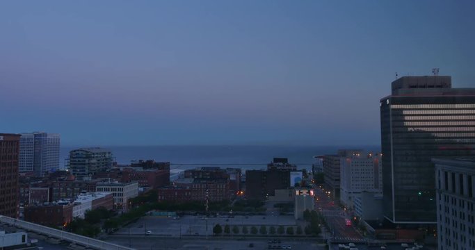 A morning sunrise timelapse shot of the Cleveland skyline with Lake Erie in the distance.	