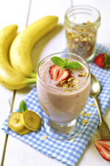 Banana smoothie with strawberry and oat.