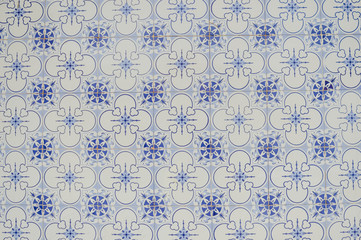 Exterior old house facade detail of the azulejo traditional tiles in Portugal. Abstract background