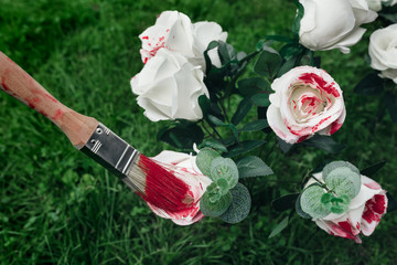 White roses and paintbrush