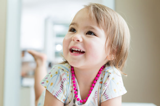 Happy smiling toddler girl