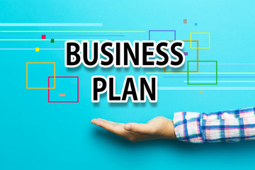 Business Plan concept with hand