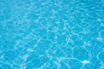 Swimming pool with sunny reflections