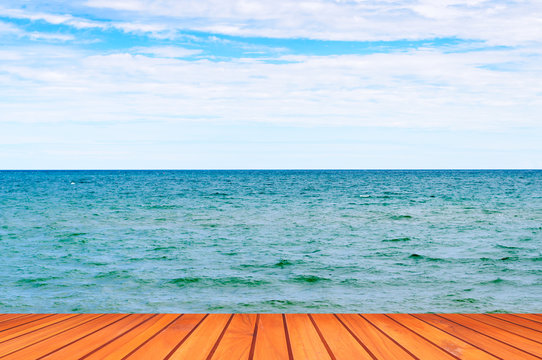Fototapeta Beautiful Beach Ocean View With Wooden Floor  
