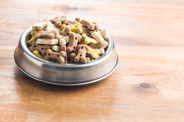 Dog food shaped like bones.