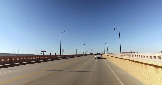 A driver's perspective going over Hope Memorial Bridge in downtown Cleveland, Ohio.  	