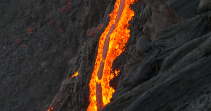 Hawaiian Lava flow from Kilauea volcano Hawaii. Lava stream flowing in real-time from Kilauea volcano around Hawaii volcanoes national park, USA.
