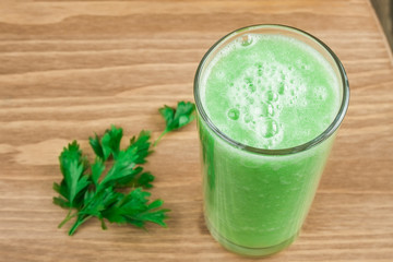 Healthy green smoothie with celery and parsley.