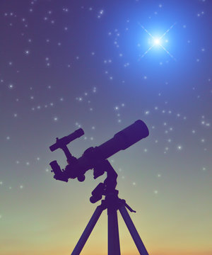 Silhouette of a telescope with starry skies.