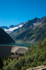 Obraz na płótnie Canvas Lake Schlegeis dam Zillertal, Austria / Beautiful water reservoir for hydropower in the Tyrolean Alps