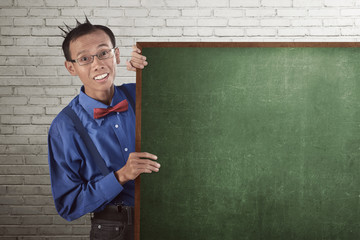 Nerd man wearing suspender and bow tie