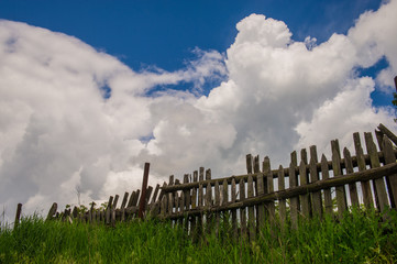 old wooden fence and grass