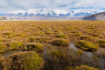 Mount Muztag Ata, the father of ice mountains, and the Karakul Lake, on the Pamirs Plateau, Taxkorgan, Kashgar, Xinjiang, China