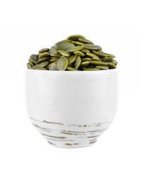 Pumpkin seeds on a white background