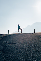 landscape view of great mountains and man silhouette, watching panorama