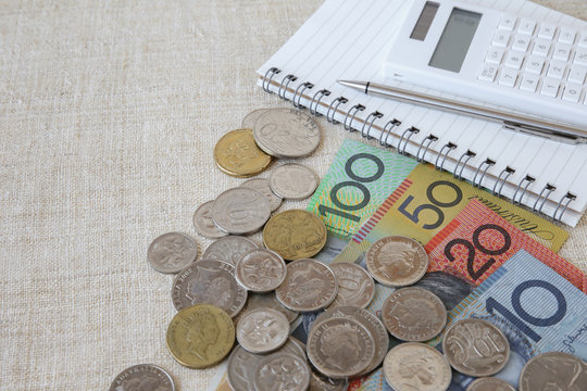 Australian money, AUD with calculator, notebook