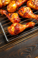 Grilled chicken legs on the grill