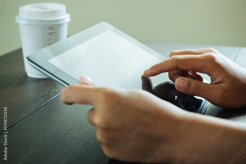 Poster close up hand use tablet on table