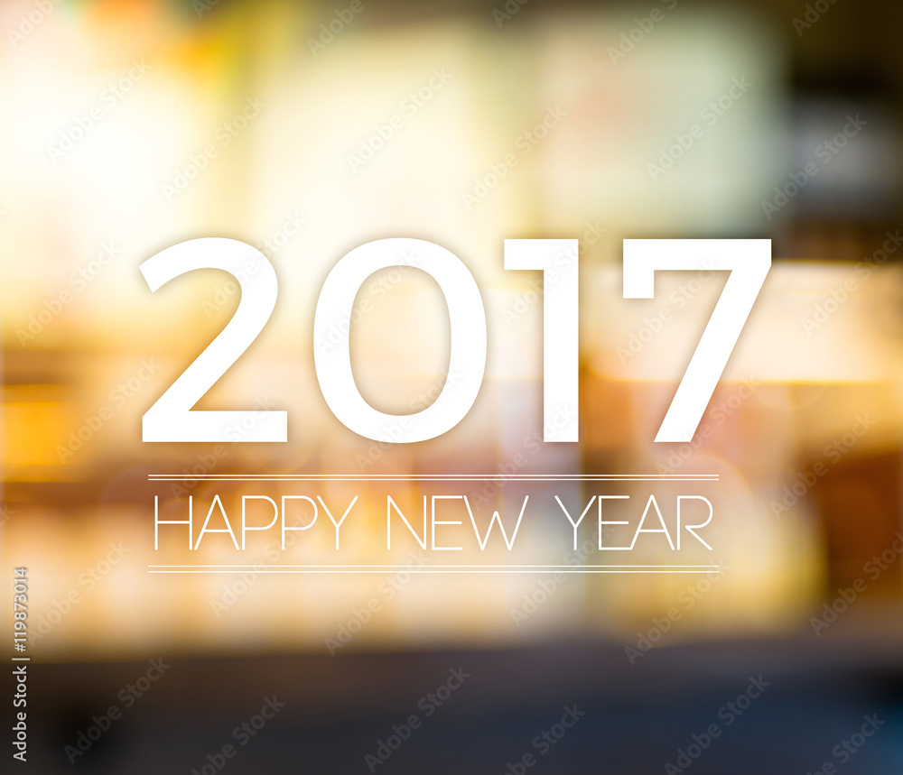 Poster 2017 happy new year on abstract festive blur bokeh light backgro