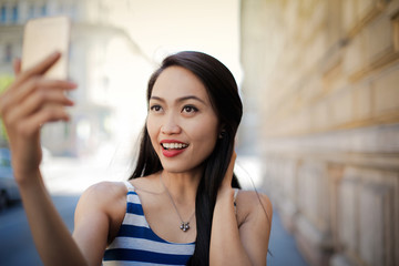 Beautiful girl doing a selfie