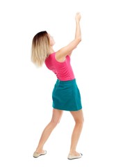 back view of standing girl pulling a rope from the top or cling to something. Isolated over white background. Blonde in a red sweater and green skirt drawn above.