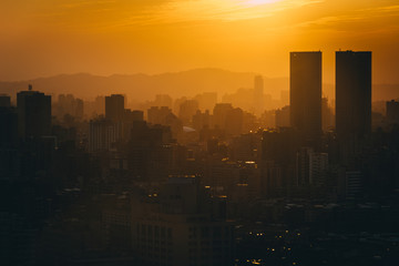 View of buildings in haze at sunset, from Elephant Mountain, in