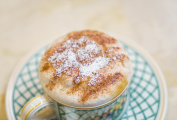 Latte Coffee art on the wooden table
