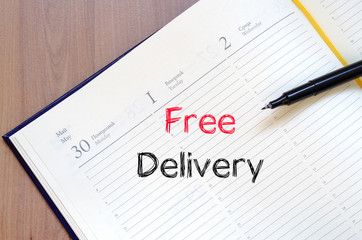 Free delivery text concept on notebook