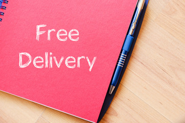 Free delivery text concept on notebook