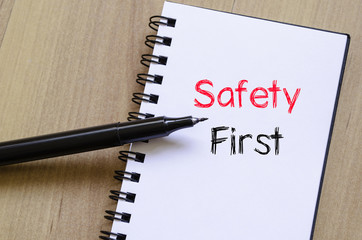 Safety first text concept on notebook