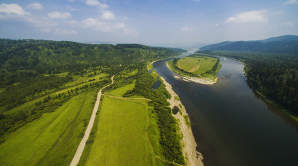 Fototapeta na wymiar panorama of fields and river from the air