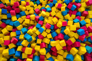 Colored foam rubber cubes background