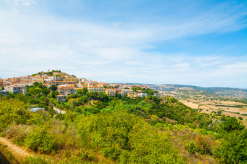 Fototapeta na wymiar small town on a hill in Sardinia