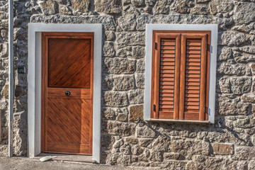 Fototapeta na wymiar door and window in a rustic wall
