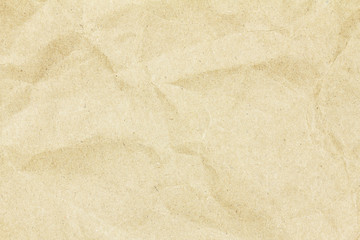 Recycled crumpled brown paper texture or paper background for design with copy space for text or image.