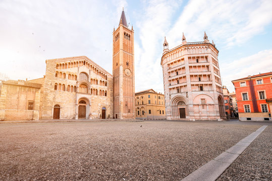 Parma cathedral with Baptistery leaning tower on the central square in Parma town in Italy