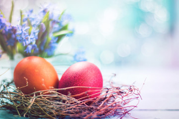 Easter concept with colorful eggs on wooden background