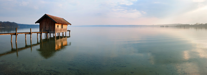 Fishing Hut by Calm Lake at Sunset, Clouds Reflecting in the Water, Ammersee, Bavaria