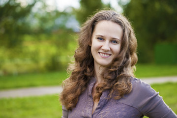 Fototapeta premium Portrait of beautiful young happy woman