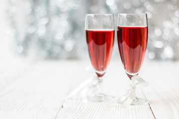 Pink champagne and new year decorations.Soft focus