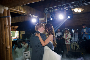 Amazing wedding couple's first dance inside with fume