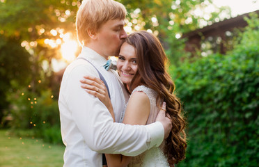 Sweet and lovely hugs of beautiful wedding couple