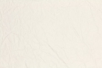 Recycled crumpled light brown paper texture or paper background for design with copy space for text or image.