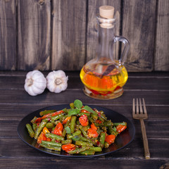 Healthy green beans, red cherry tomato with sesame seeds