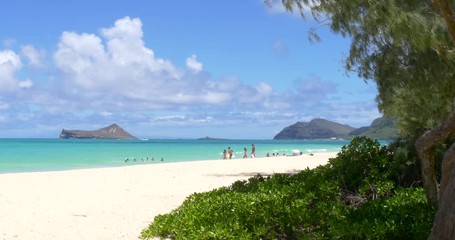 Turquoise water in Waimanalo Beach at sunny day. Windward side of Oahu Island, Hawaii

