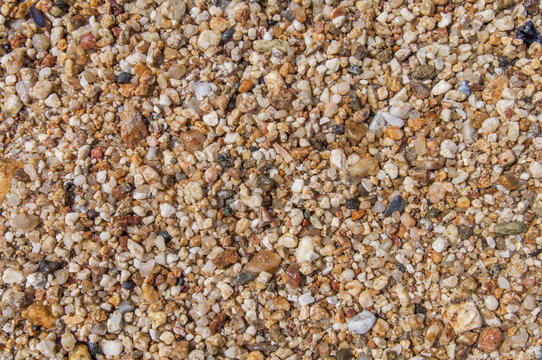 Sea pebble stone close texture background