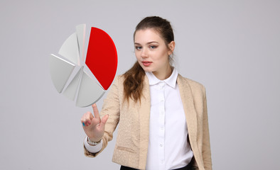 Woman shows a pie chart, circle diagram. Business analytics concept.